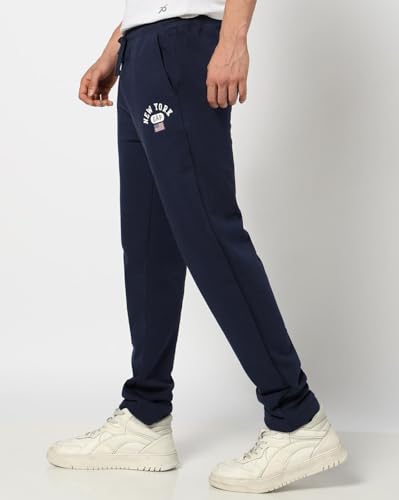 Navy blue Gap men's regular fit mid-rise joggers with elastic waistband and side pockets, made for comfortable sportswear.