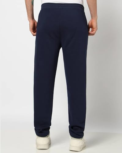 Gap men's navy blue regular fit mid-rise joggers with elastic waistband and tapered leg, made for comfortable sports wear.