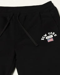 Black Gap men's regular fit mid-rise joggers with elastic waistband and pockets, designed for comfortable sportswear.