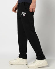 Black Gap men's regular fit mid-rise joggers made of soft fabric, shown flat with drawstring waistband and side pockets.