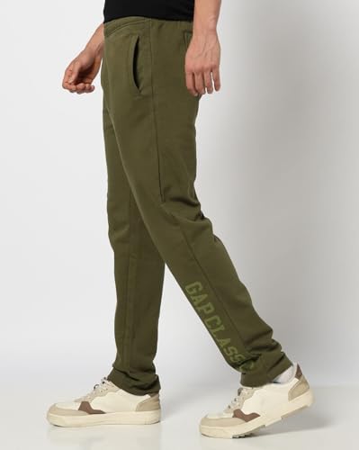 Men's Gap logo print track pants with sporty design, featuring the brand logo and comfortable fit, ideal for casual wear.