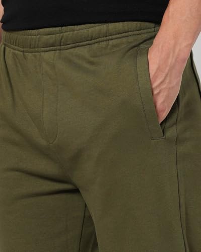 Men's Gap logo print track pants with athletic fit, navy color, and side pockets, designed for sportswear and casual comfort.