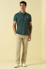 Men Green Solid Polo Neck T-Shirt