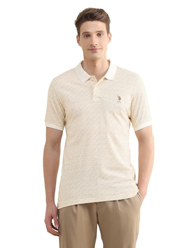 U.S.Polo Association men's tropical printed slim fit polo shirt with short sleeves and vibrant tropical pattern.