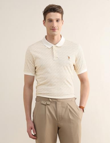 U.S.Polo Association men's tropical printed slim fit polo shirt with short sleeves and vibrant tropical pattern.