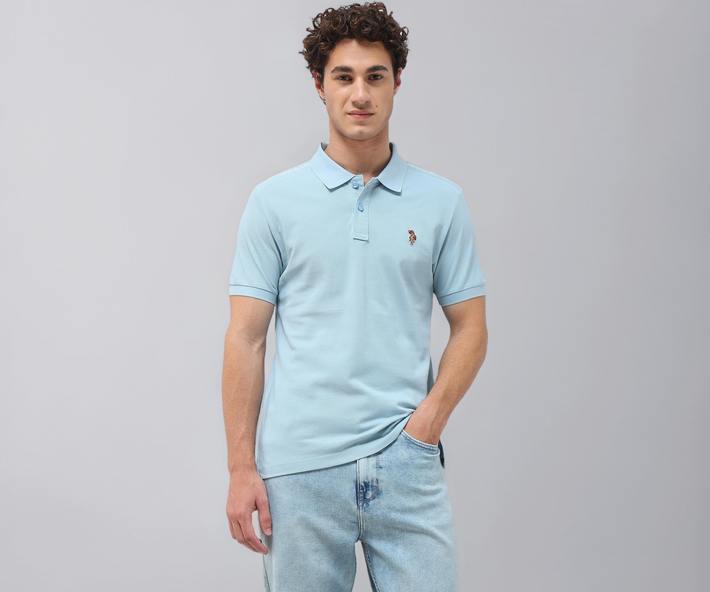 U.S. Polo Assn. Denim Co. Men's Solid Slim Fit Polo Shirt (UDTSH4130_Light Blue_XL)