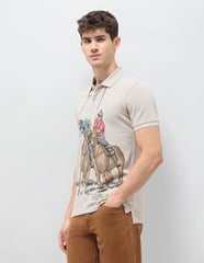 U.S. Polo Assn. Denim Co. men's beige graphic printed muscle fit polo shirt with short sleeves and brand logo design.