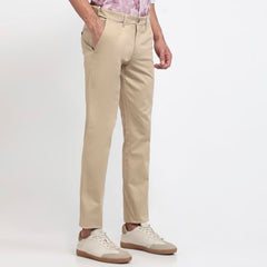 Parx men's low rise tapered fit casual trousers in solid cotton blend fabric with flat front and tapered legs.