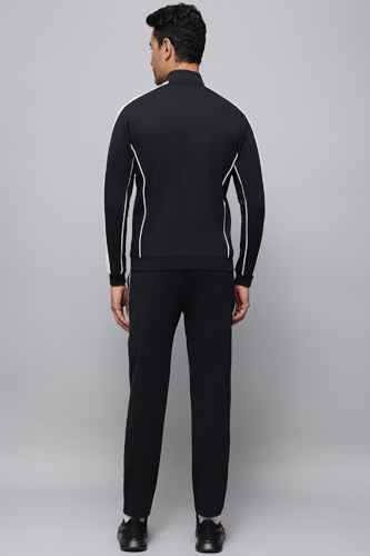 Reebok men's winter tracksuit, black and gray, with zip-up jacket and matching pants, suitable for cold weather activities.