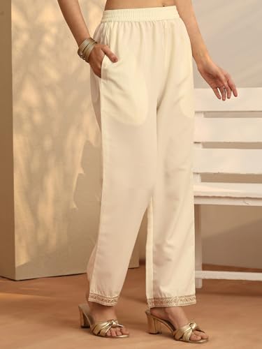 Libas embroidered silk blend straight kurta set for women, featuring intricate embroidery, paired with matching dupatta and pants.
