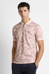 Men's pink print polo neck T-shirt by Van Heusen, featuring short sleeves and a stylish print design.