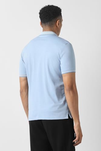Men's light blue solid polo neck T-shirt by Van Heusen, short-sleeve style, displayed flat with collar and fabric texture visible.