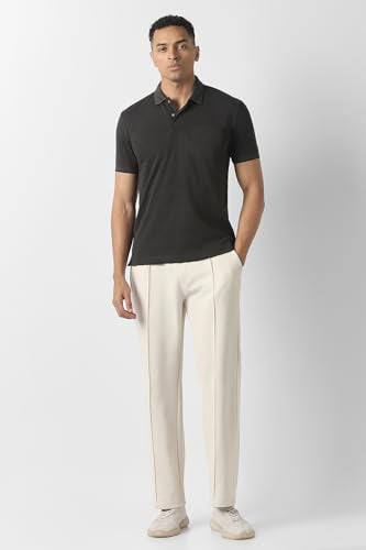 Men's black solid polo neck T-shirt by Van Heusen, showcasing a close-up of the classic short-sleeve design and polo collar.
