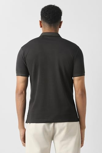 Men's black solid polo neck T-shirt by Van Heusen, short sleeve, classic fit, smooth fabric, displayed on a hanger.