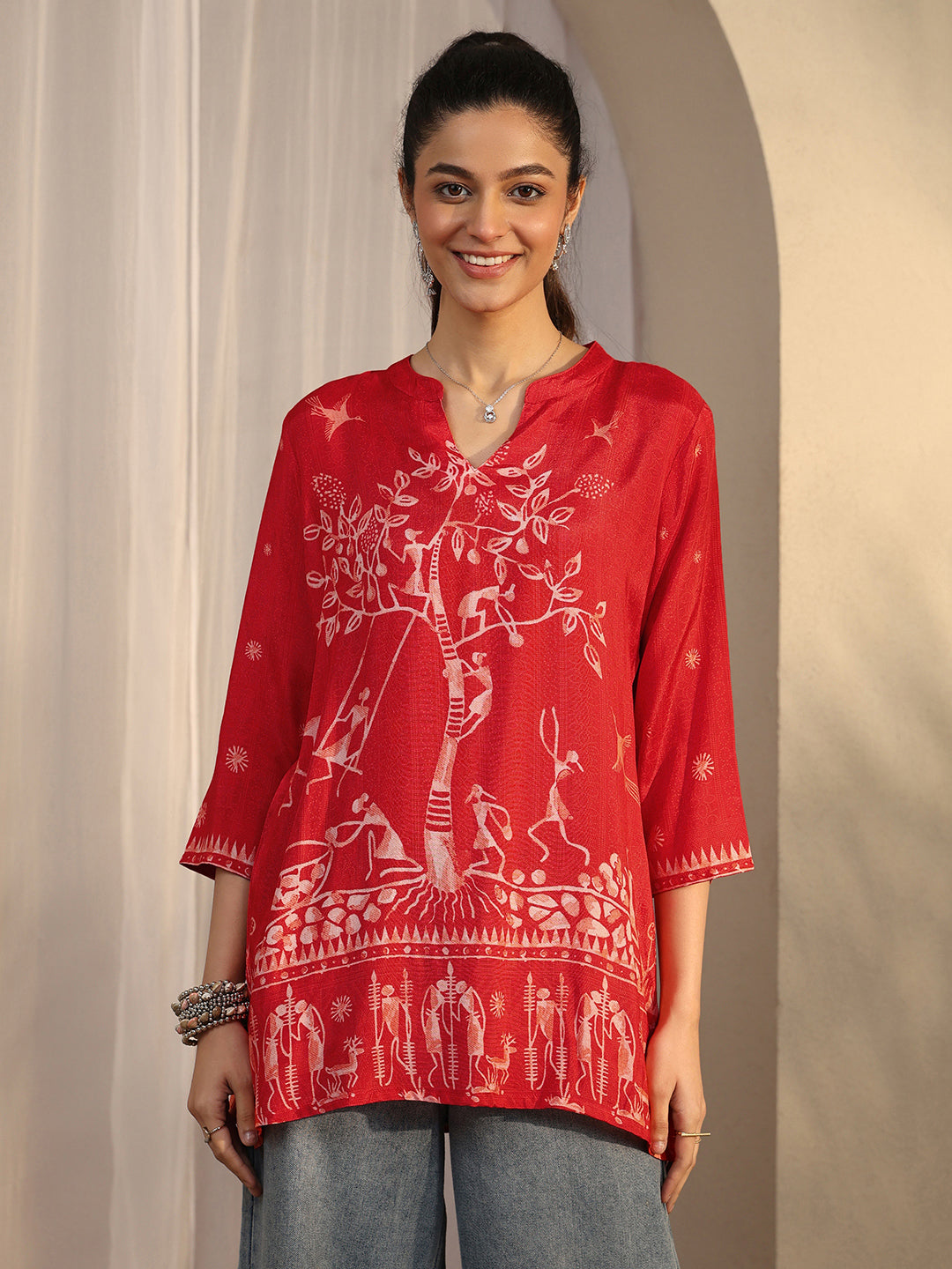 Libas printed silk blend straight short kurti for ladies, with colorful floral pattern and traditional design.