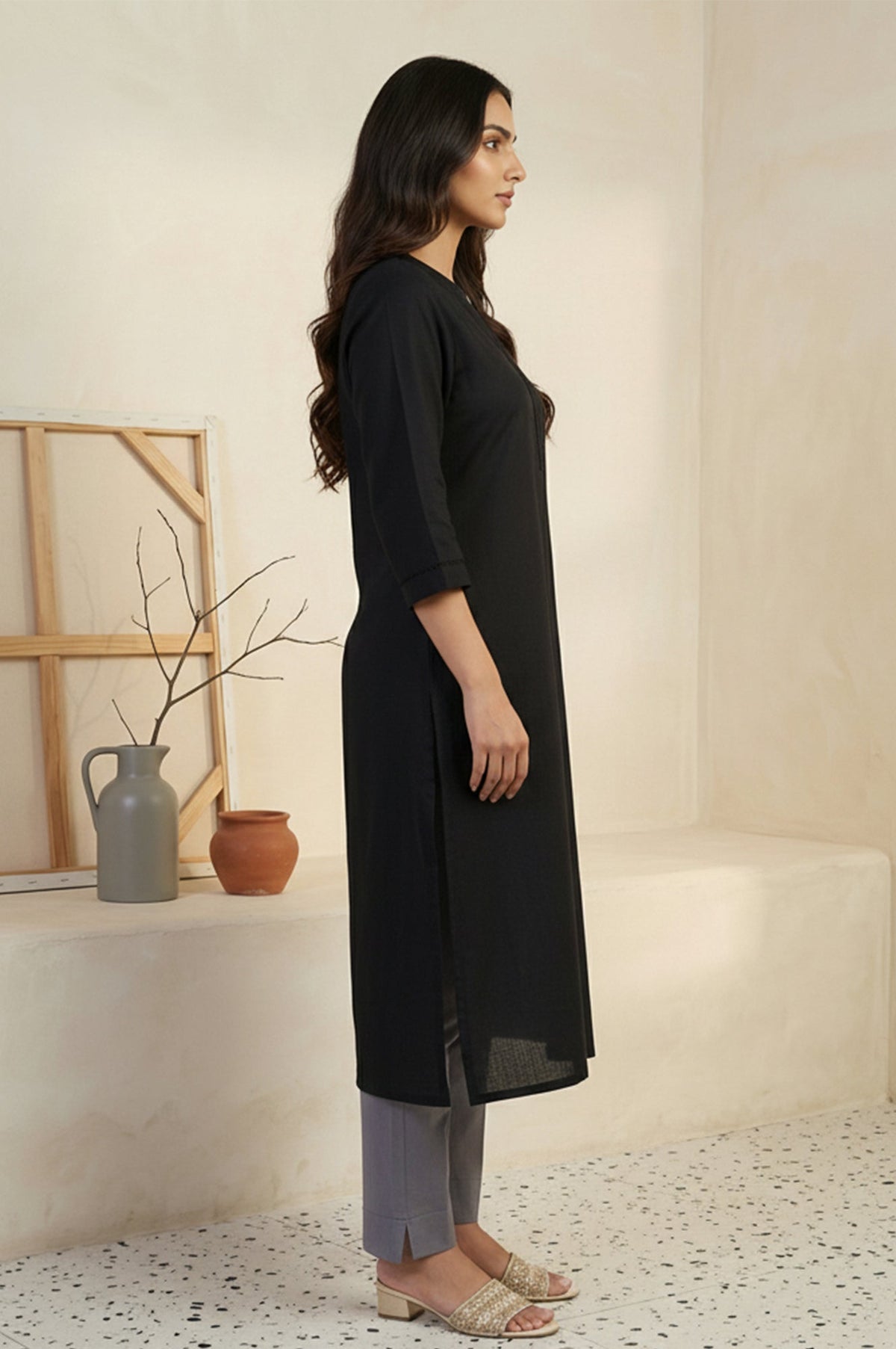 Aurelia ladies western kurti in vibrant fabric, featuring a stylish design with intricate patterns, displayed on a hanger.