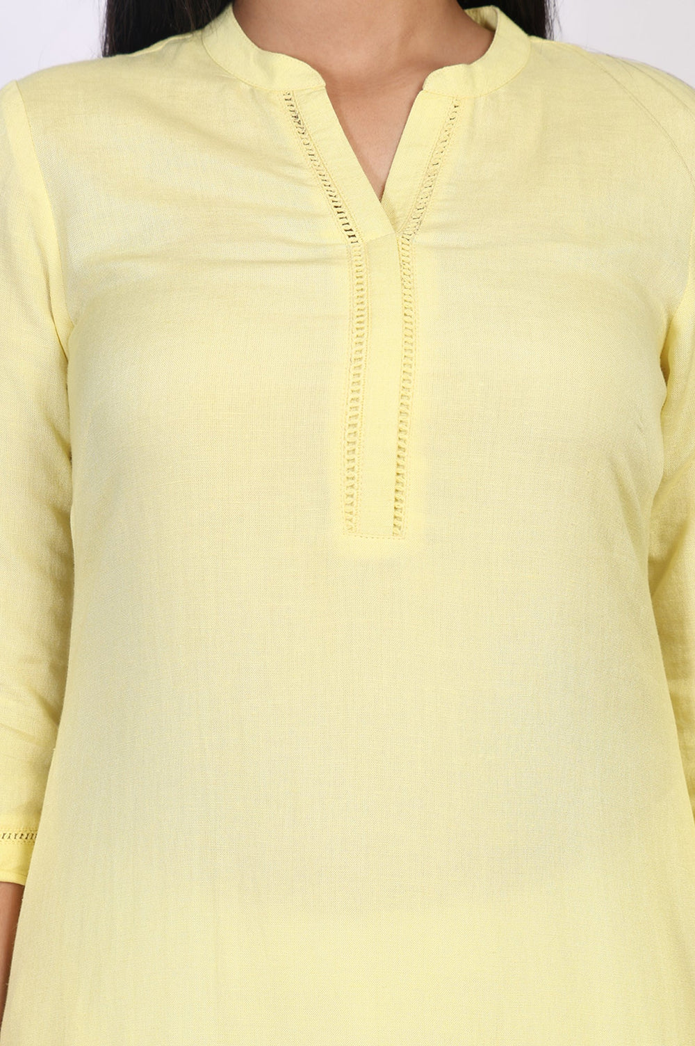 Aurelia ladies Western kurti in vibrant fabric, featuring stylish design and traditional patterns, displayed on a hanger.