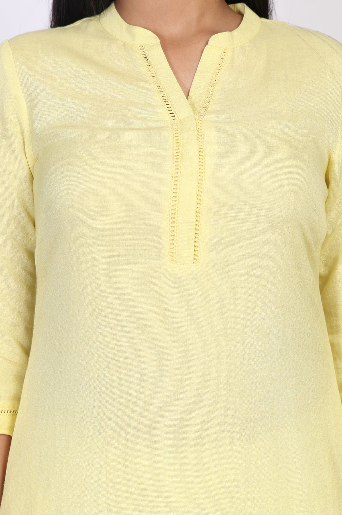 Aurelia ladies Western kurti in vibrant fabric, featuring stylish design and traditional patterns, displayed on a hanger.