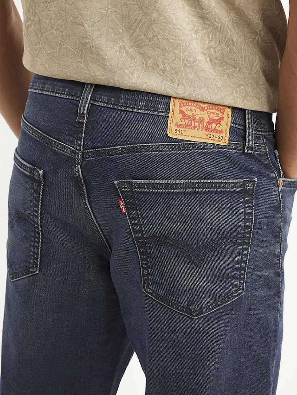 Levis men's jeans A6635-0026 in classic blue denim, showing detailed stitching and fit on a model.