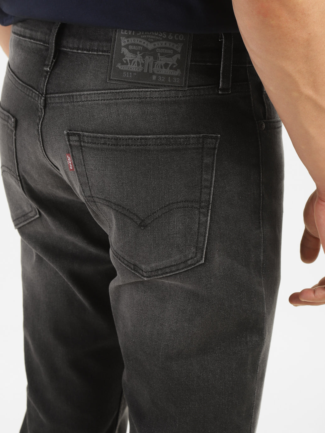 Back view of Levi's men's jeans A7710-0019, showing detailed stitching and classic denim fabric.