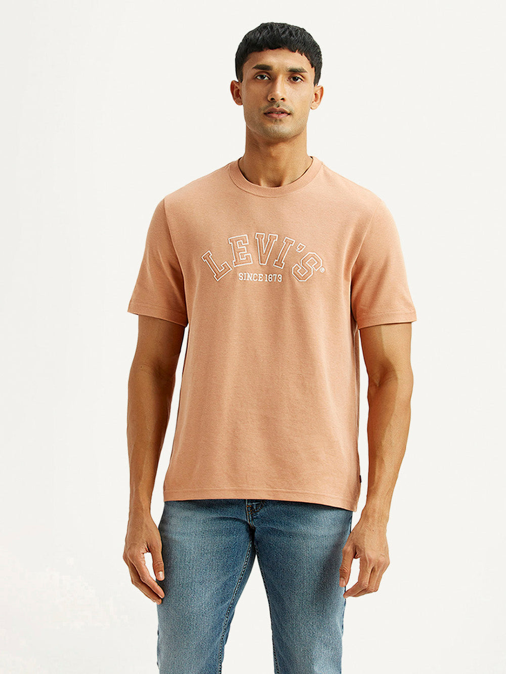Levi's men's embroidered peach crew neck T-shirt with short sleeves, featuring colorful embroidery on the front.