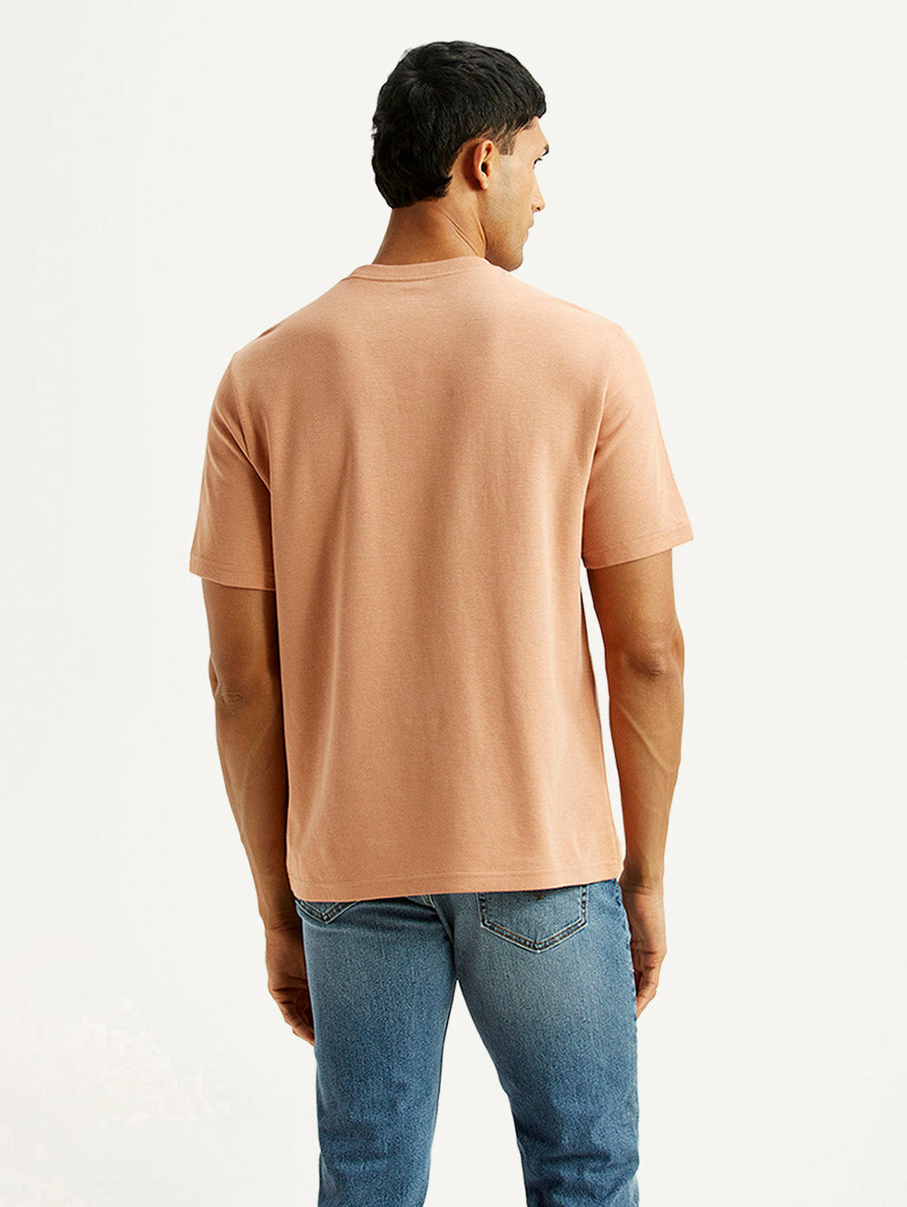 Levi's men's crew neck T-shirt with embroidered peach design, back view showing the detailed embroidery and classic fit.