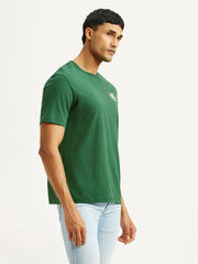 Levi's men's green crew neck T-shirt with brand logo, side view showing fit and casual style.