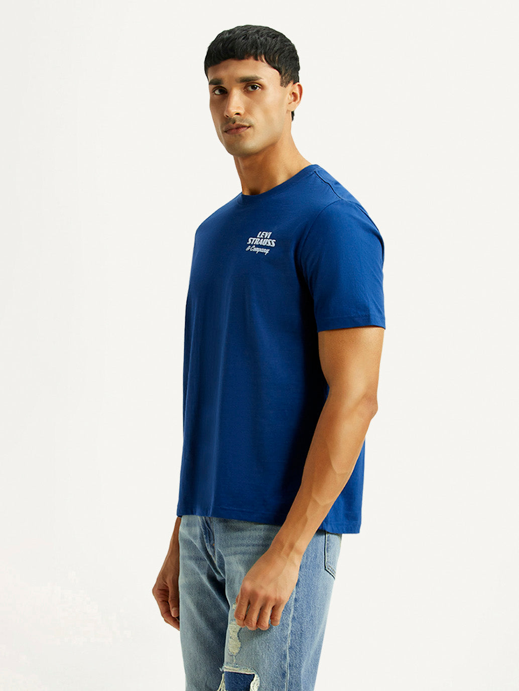 Levi's men's blue crew neck T-shirt with brand logo, side view showing soft fabric and classic fit.
