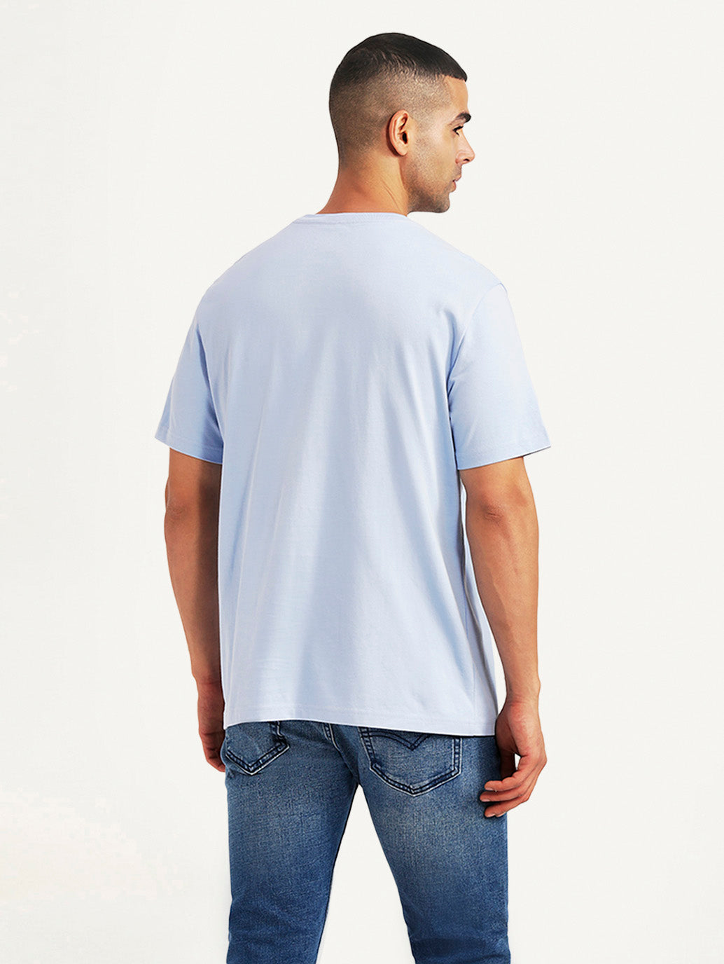 Light-blue men's graphic print crew neck T-shirt by Levi's, showing the back design and casual fit.