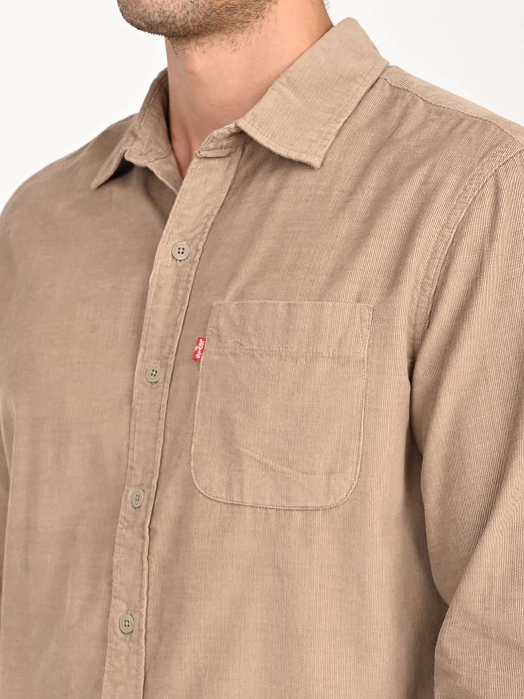 Levis men's beige corduroy slim fit casual shirt with collar and long sleeves, detailed close-up of fabric texture.