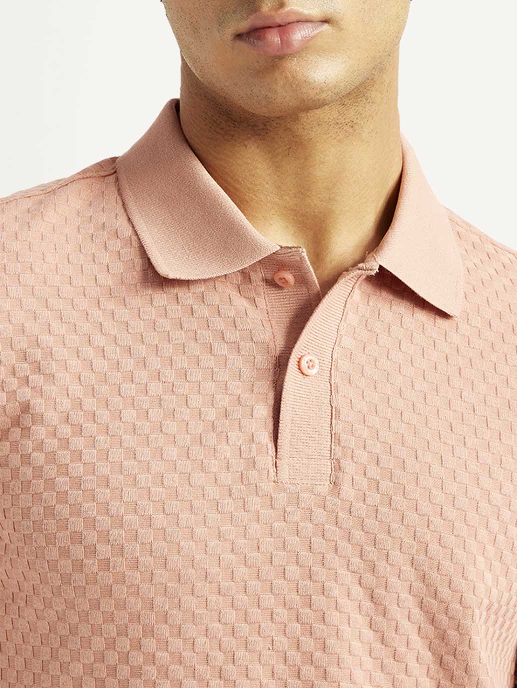 Levi's men's redloop textured pink slim fit polo T-shirt with short sleeves, showing detailed fabric texture and classic collar.