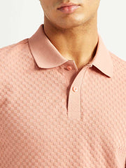 Levi's men's redloop textured pink slim fit polo T-shirt with short sleeves, showing detailed fabric texture and classic collar.