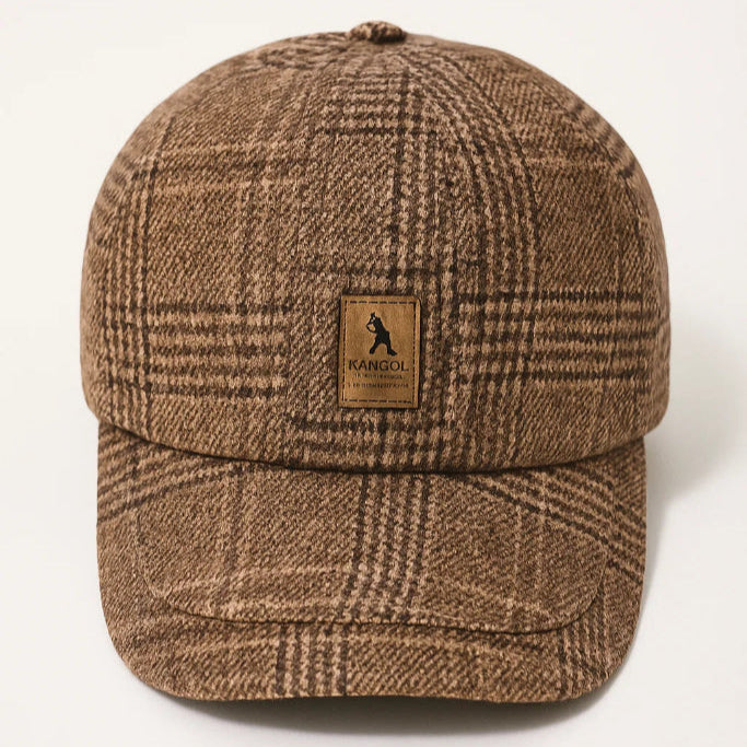 Brown plaid cap with a logo on a white background