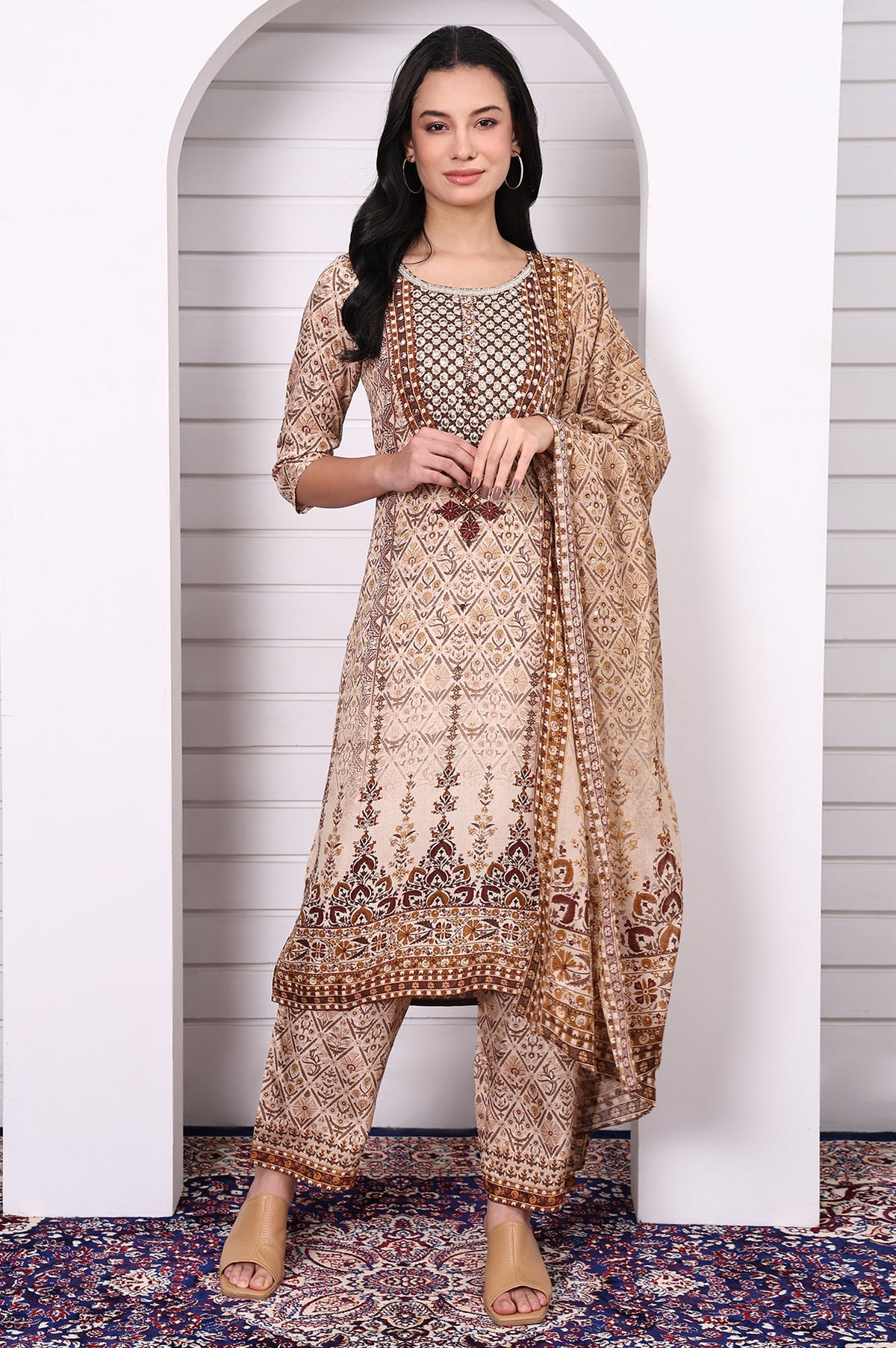 Aurelia Ladies Western Kurti 3-piece set featuring stylish kurtis in vibrant colors, displayed on a mannequin.