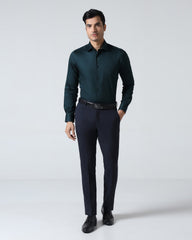 Blackberry men's teal non-iron solid formal shirt, Sylvia style, displayed on a hanger with a crisp collar and smooth fabric.