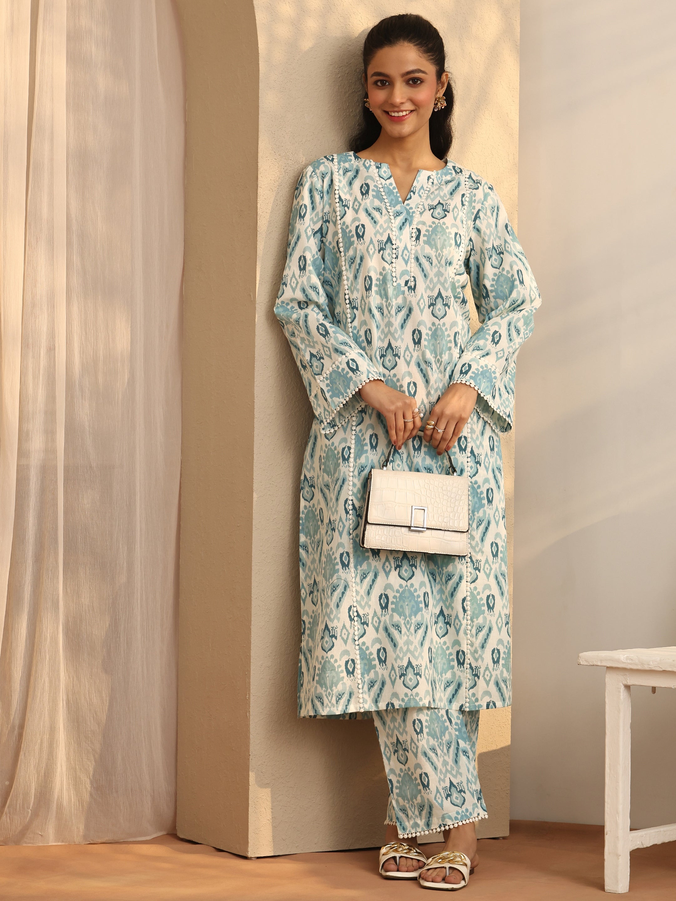 Blue printed cotton A-line Kurta set for ladies, includes top and bottom, by Libas, stylish Western Kurti 2-piece ensemble.