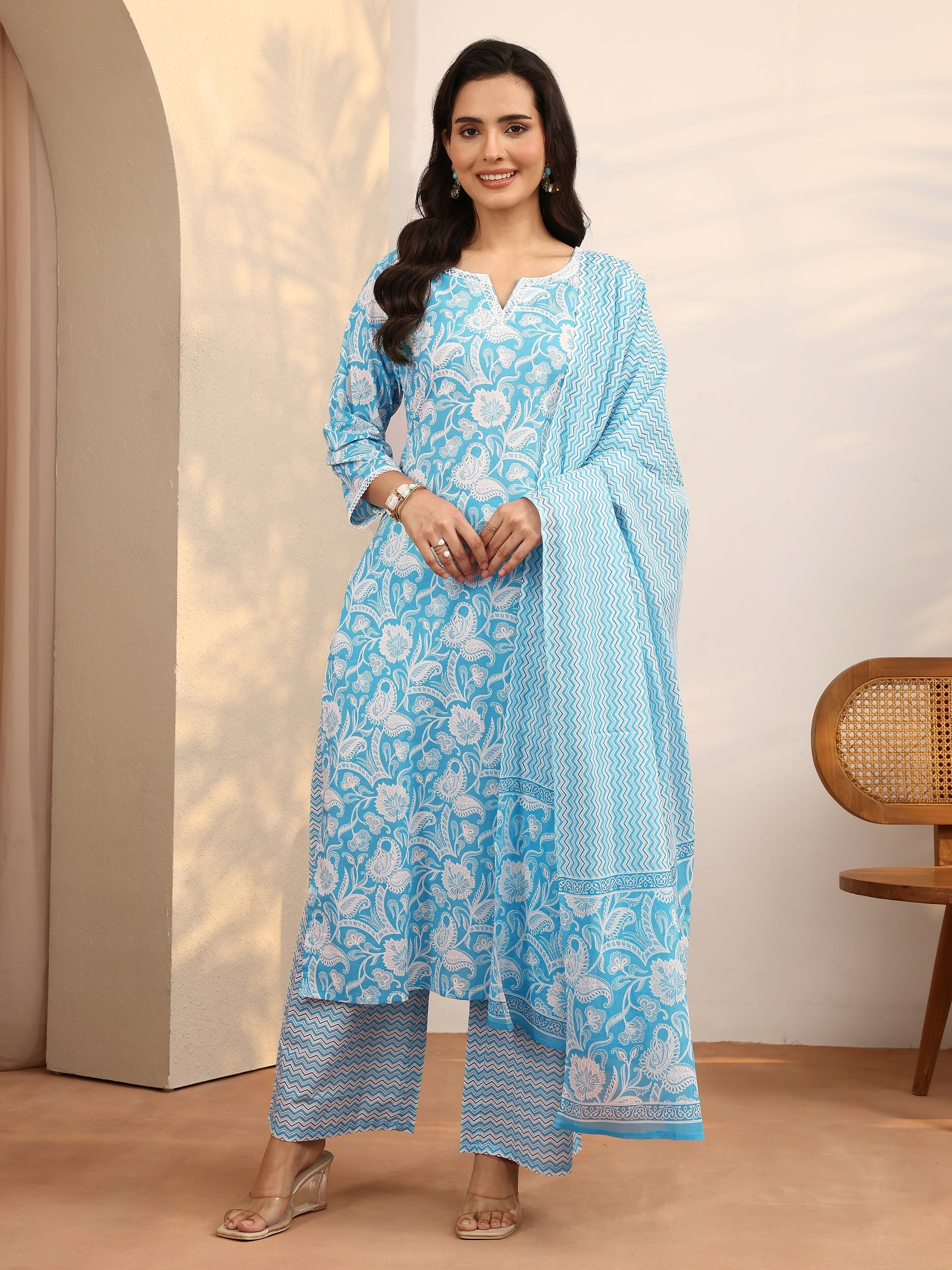 Blue printed cotton straight suit set with dupatta, ladies Western Kurti 3-piece set by Libas showing the elegant design and fabric details.