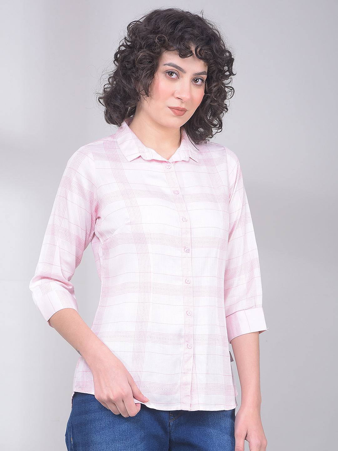 Pink checked ladies Western shirt from Crimsoune Club with long sleeves and classic collar, displayed on a hanger.