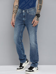 Levi's men's 511 slim fit blue jeans with mid-rise waist, classic five-pocket design, and slim silhouette.