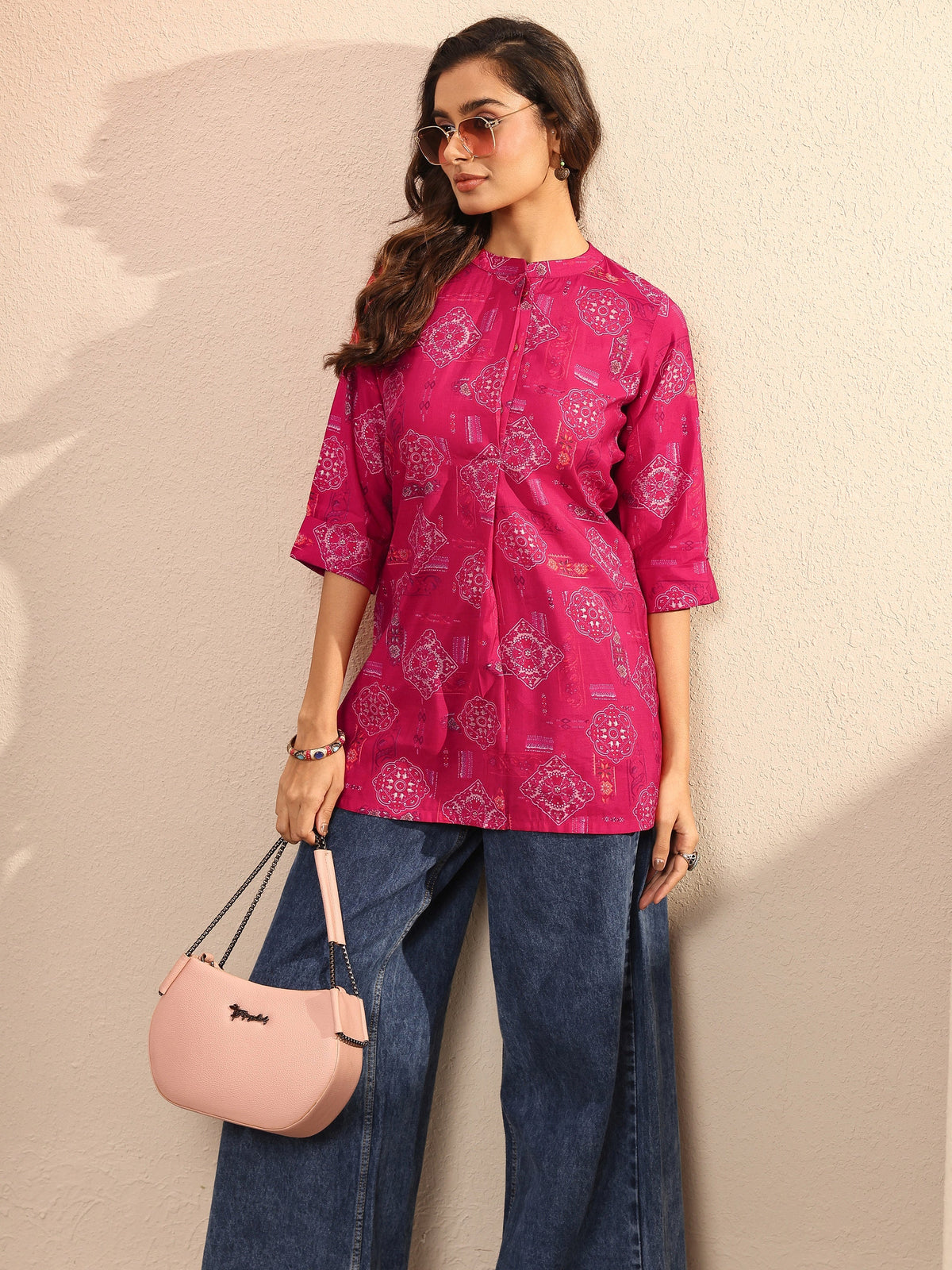Pink silk-blend straight Western kurti for women with block print design by Libas, perfect for casual or festive wear.