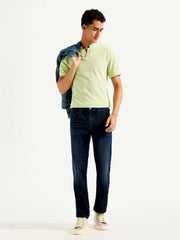 Levi's men's 511 blue slim fit mid-rise jeans shown on a hanger, highlighting the classic denim style and fit.